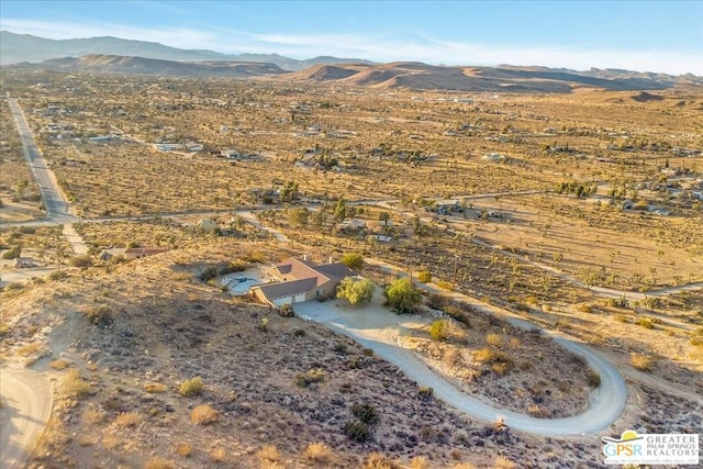 bird's eye view with a mountain view