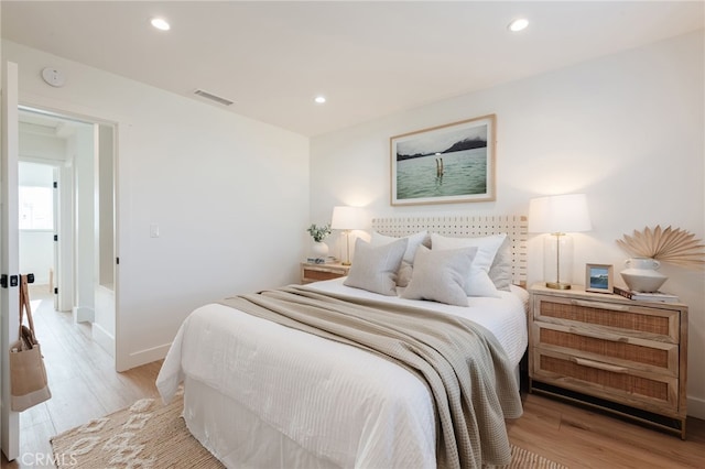 bedroom featuring light hardwood / wood-style flooring