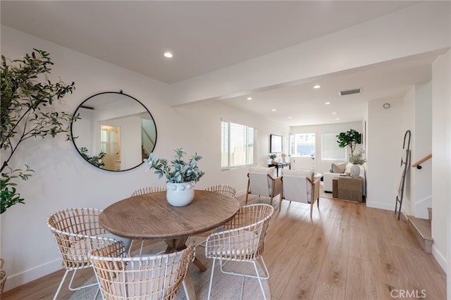 dining room featuring light hardwood / wood-style flooring