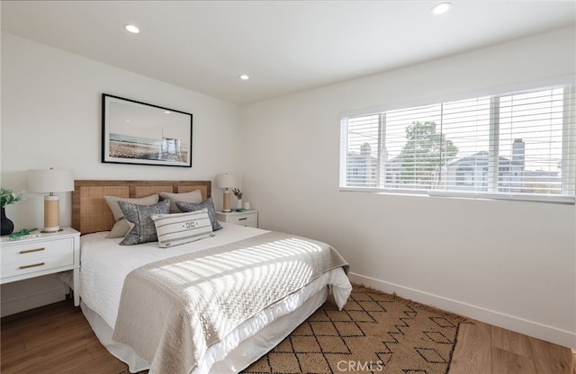 bedroom featuring hardwood / wood-style flooring