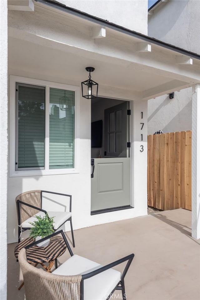 doorway to property featuring a patio