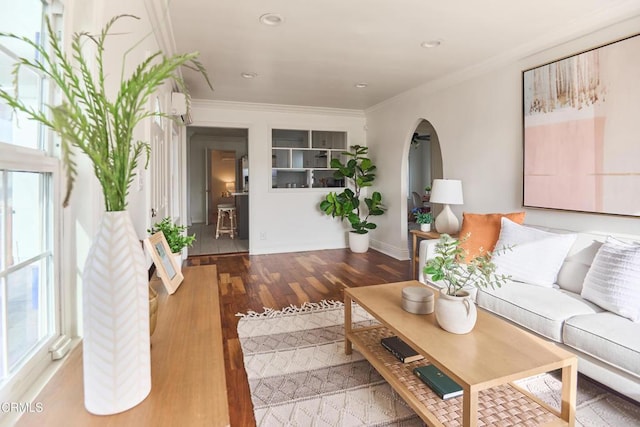 living room with ornamental molding and wood-type flooring