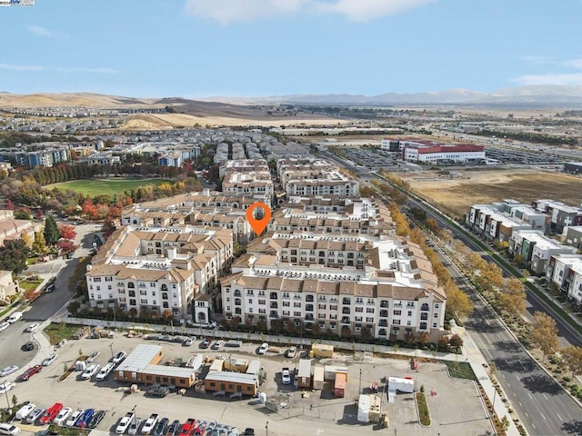 drone / aerial view featuring a mountain view