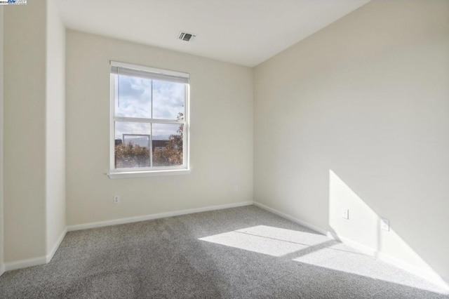 empty room with carpet floors