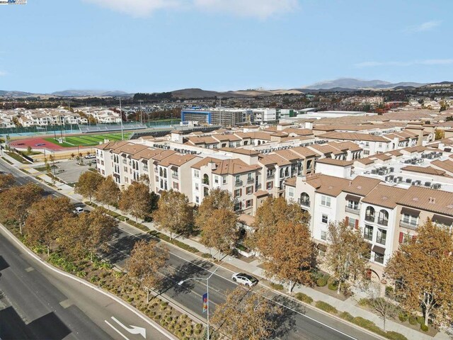 drone / aerial view featuring a mountain view