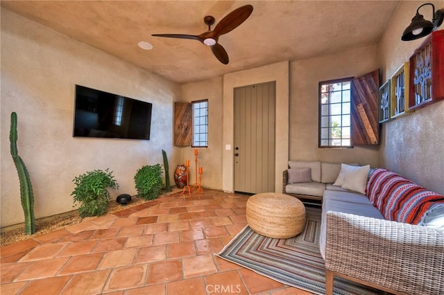 living room with ceiling fan