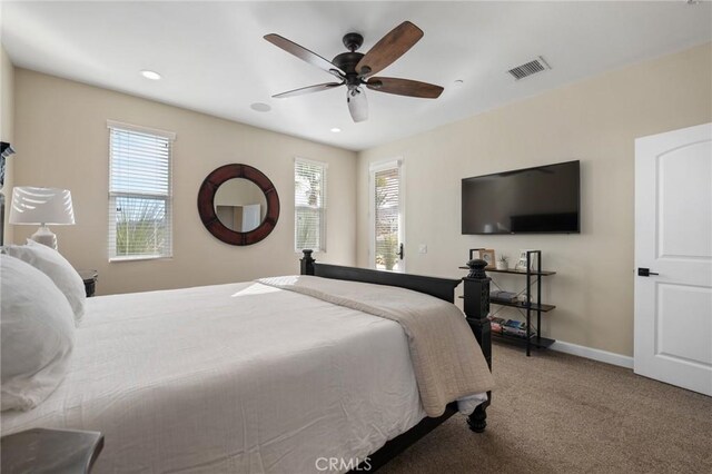 bedroom featuring ceiling fan and carpet flooring