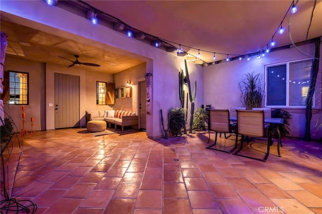 view of patio with ceiling fan and outdoor lounge area