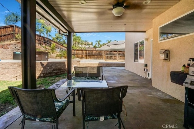 view of patio / terrace featuring ceiling fan