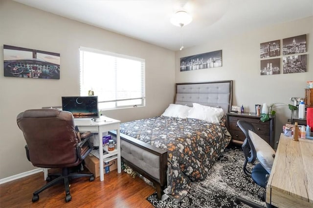 bedroom featuring dark hardwood / wood-style flooring