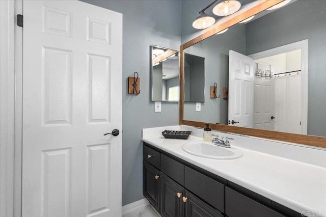 bathroom with vanity and a shower with curtain