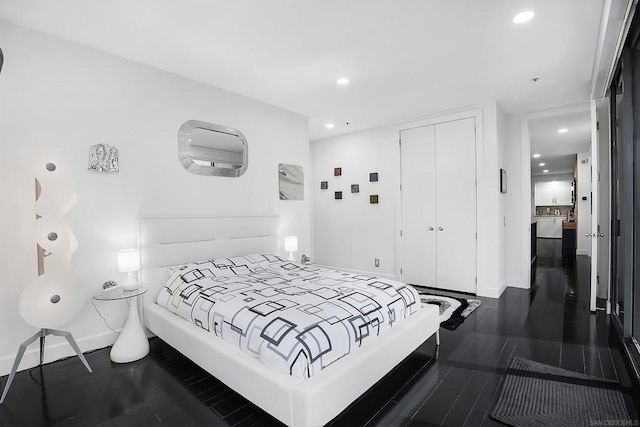 bedroom featuring dark wood-type flooring