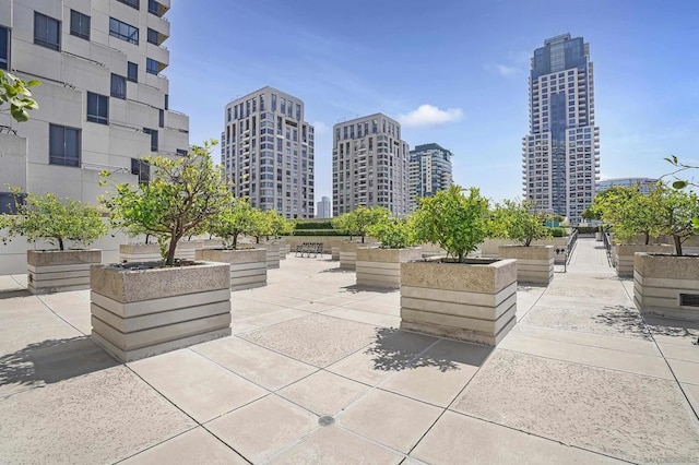 view of property's community with a patio