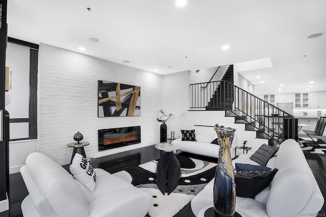 living room featuring dark hardwood / wood-style flooring