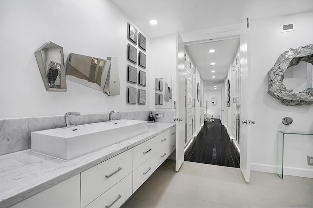 bathroom featuring vanity and tile patterned flooring