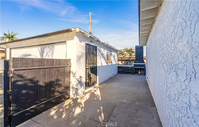 view of home's exterior with a patio area