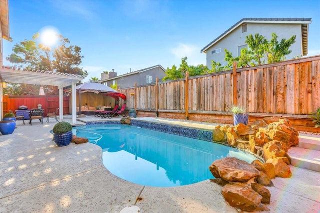 view of pool featuring a pergola and a patio