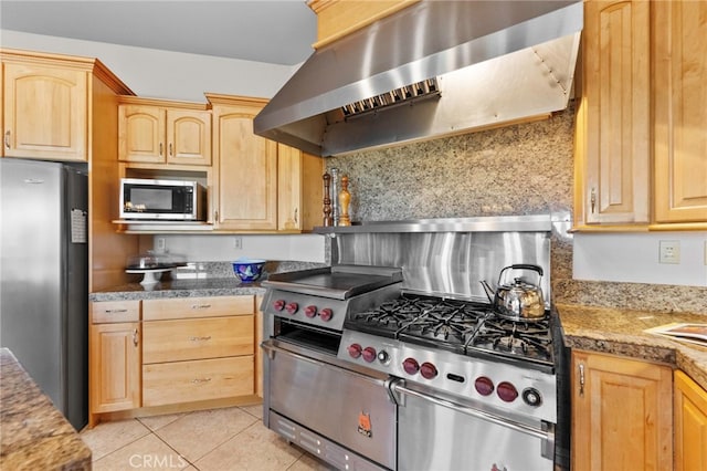 kitchen featuring backsplash, range hood, stainless steel appliances, light tile patterned floors, and light brown cabinetry