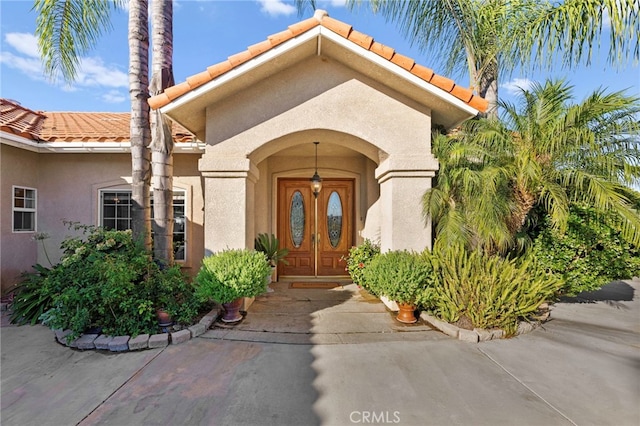 view of exterior entry with french doors