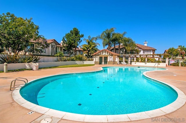 view of swimming pool featuring a patio