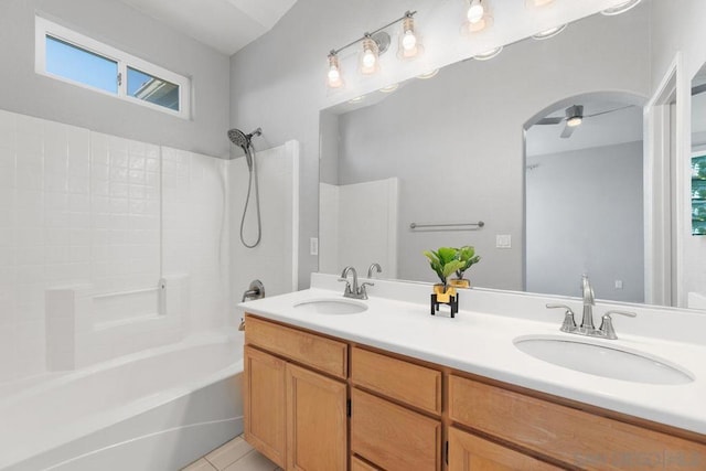 bathroom featuring tile patterned flooring, vanity, bathtub / shower combination, and ceiling fan