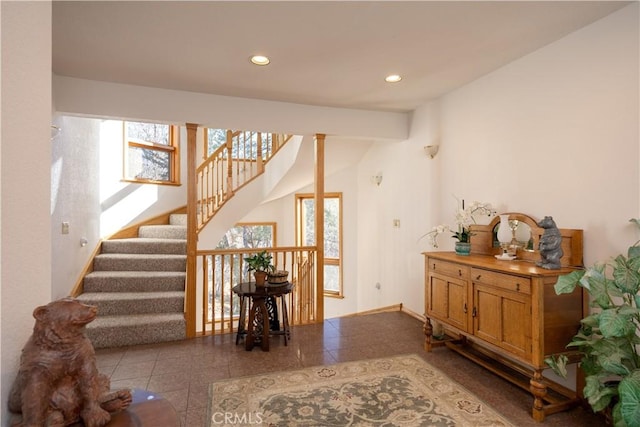 interior space featuring tile patterned floors and plenty of natural light