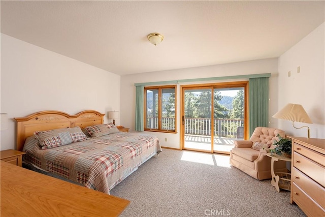 bedroom featuring carpet floors and access to exterior