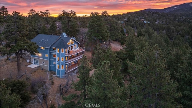 aerial view at dusk with a mountain view