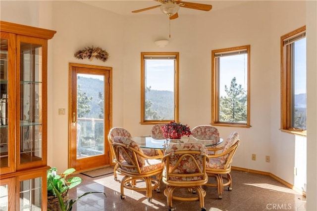 dining area with ceiling fan