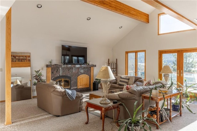 carpeted living room featuring high vaulted ceiling, a premium fireplace, and beamed ceiling