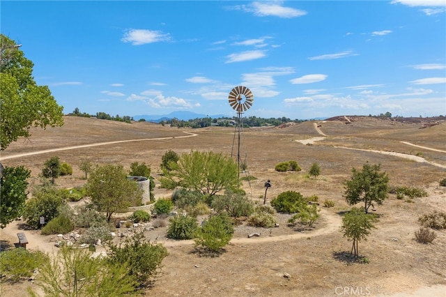 mountain view featuring a rural view