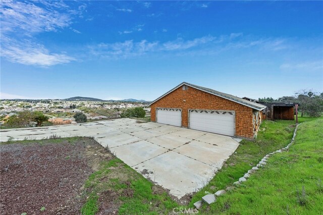 exterior space featuring a mountain view