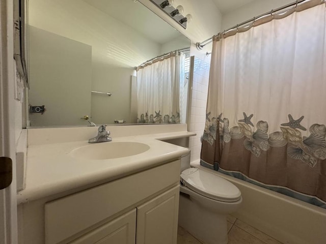 full bathroom with shower / bath combo, tile patterned floors, vanity, and toilet