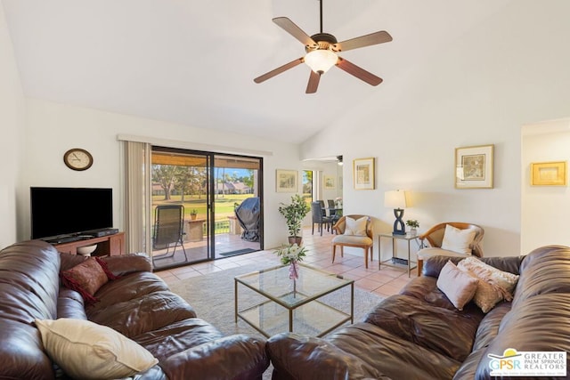 living room with ceiling fan, light tile patterned floors, and high vaulted ceiling