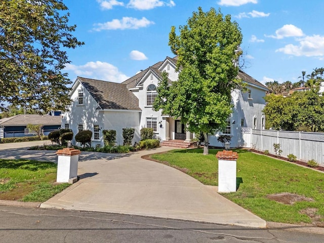 view of front of home featuring a front yard