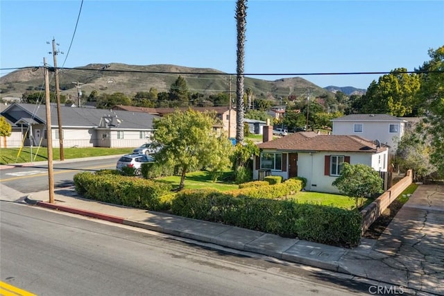 view of front of house with a mountain view