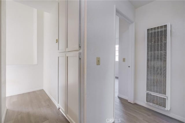 hallway featuring light hardwood / wood-style flooring