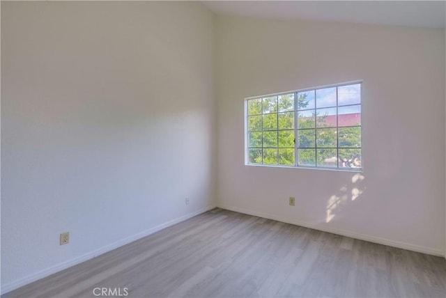 unfurnished room featuring light wood-type flooring