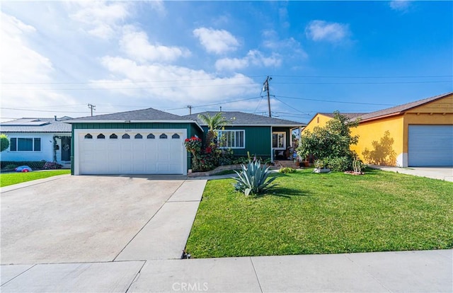 ranch-style home with a garage and a front yard