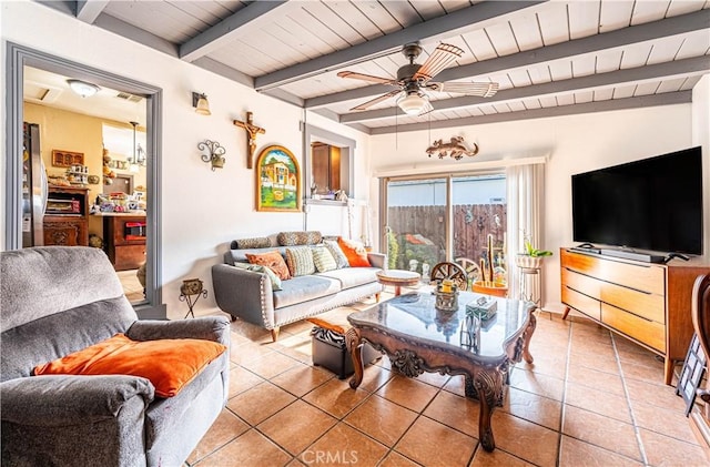 tiled living room with beamed ceiling, wooden ceiling, and ceiling fan