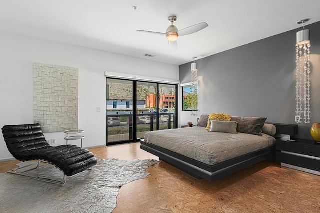 bedroom featuring ceiling fan and access to outside