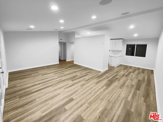 basement featuring light hardwood / wood-style flooring