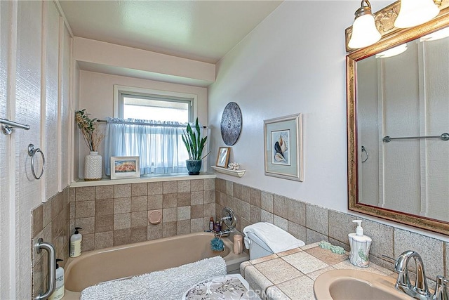 bathroom featuring a bath and vanity