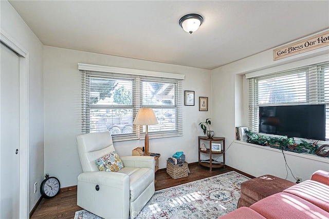 living room with dark hardwood / wood-style floors