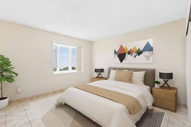 tiled bedroom featuring a textured ceiling