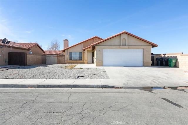 single story home with a garage