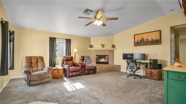 carpeted living room featuring vaulted ceiling and ceiling fan