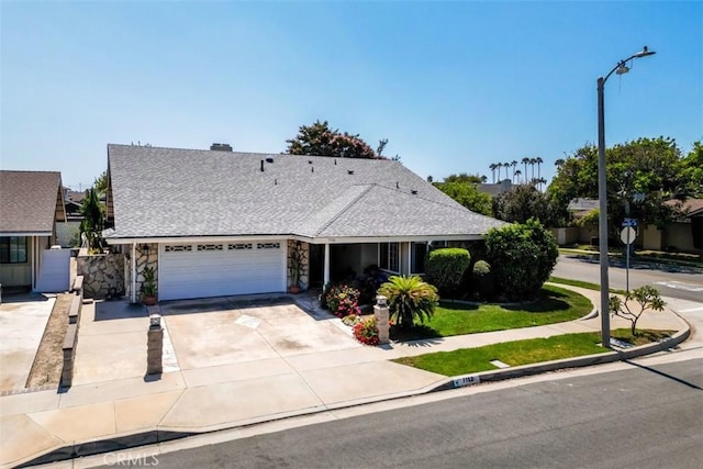 single story home with a garage