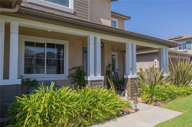 entrance to property with a porch