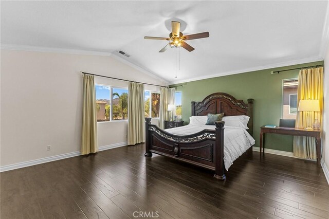 bedroom with ceiling fan, dark hardwood / wood-style flooring, and vaulted ceiling